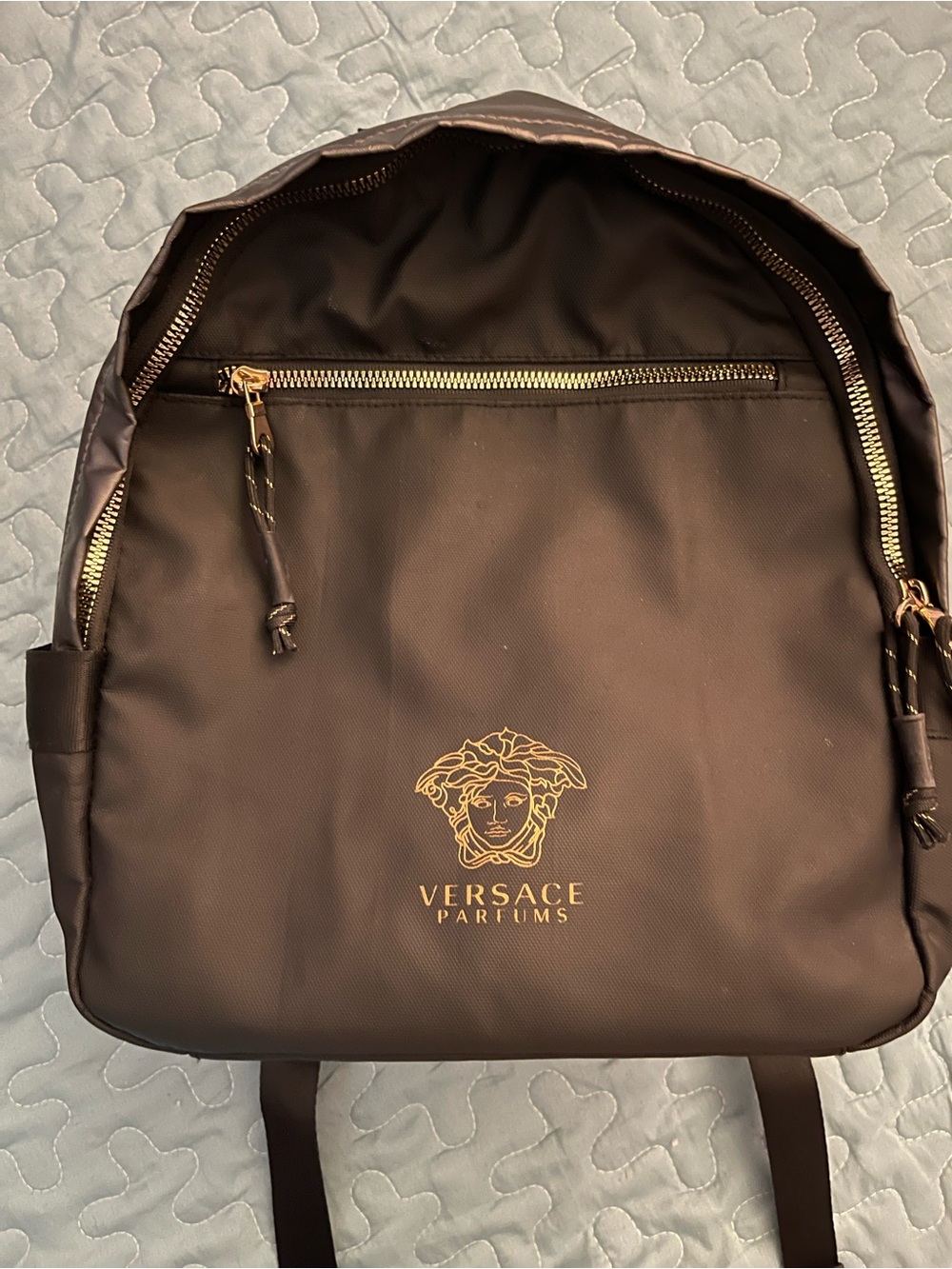 Black Backpack with Gold Logo